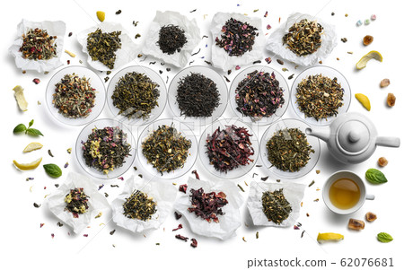 Large assortment of tea on a white background. The view from the top 62076681