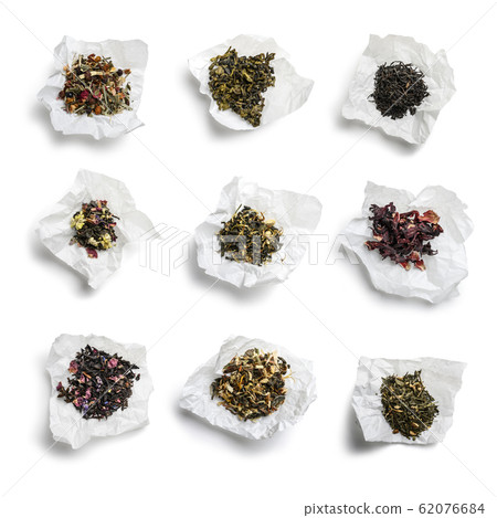 Large assortment of tea on a white background. The view from the top Large assortment of tea on a white background. The view from the top 62076684