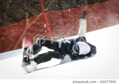 Snowboarder to fall over Snowboarder to fall over 62077992