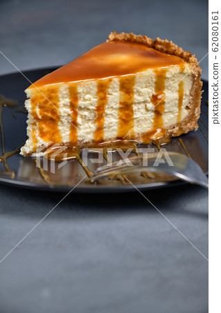 Sweet dessert from air curd cheesecake poured with 62080161