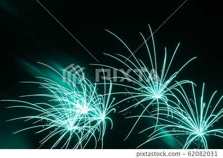 Luxury fireworks event show fine turquoise stars Luxury fireworks event show fine turquoise stars 62082031