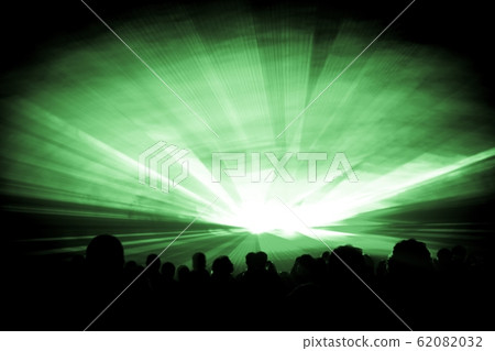 Green laser show nightlife club and party people Green laser show nightlife club and party people 62082032