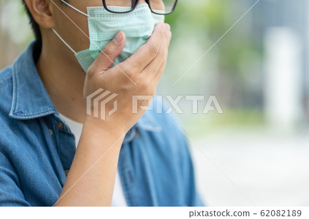 HandsomeMan wearing face mask protect filter 62082189