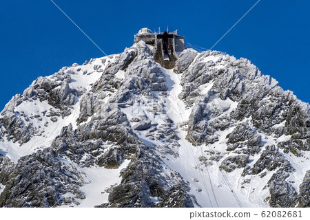 Cableway station on Lomnicky peak. Snowy High Tatras mountains, Slovakia Cableway station on Lomnicky peak. Snowy High Tatras mountains, Slovakia 62082681