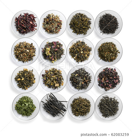 Large assortment of tea on a white background. The view from the top Large assortment of tea on a white background. The view from the top 62083259