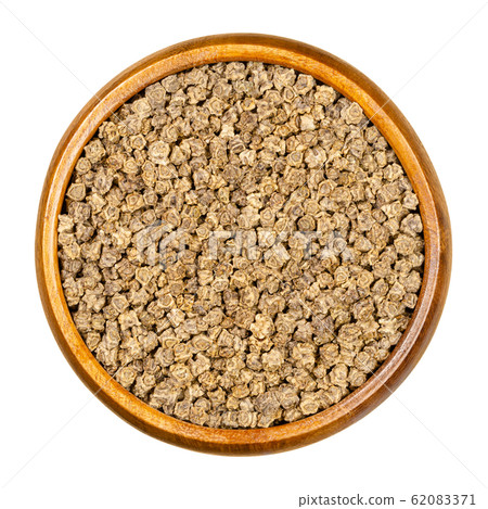 Fodder beet seeds in wooden bowl. Mangelwurzel, mangold, mangel or field beet, a variety of Beta vulgaris, a root vegetable. Seeds for sprouting. Macro food photo, close up, from above, over white. Fodder beet seeds in wooden bowl. Mangelwurzel, mangold, mangel or field beet, a variety of Beta vulgaris, a root vegetable. Seeds for sprouting. Macro food photo, close up, from above, over white. 62083371