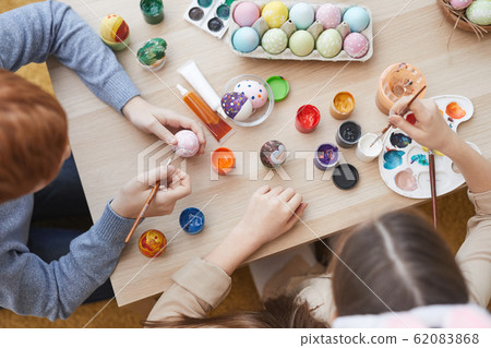 Children painting together at the table Children painting together at the table 62083868