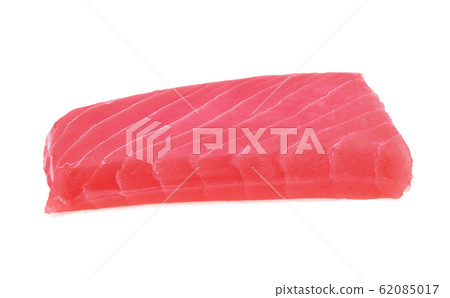 Raw tuna fish isolated on white background. Raw tuna fish isolated on white background. 62085017