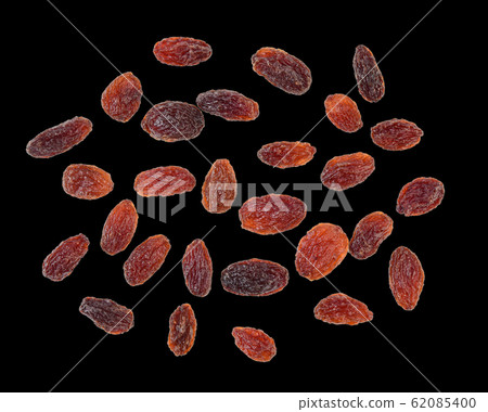 Dried raisins isolated on black background 62085400