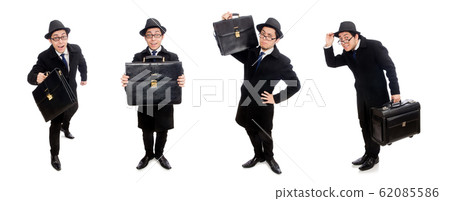 Young man holding suitcase isolated on white Young man holding suitcase isolated on white 62085586