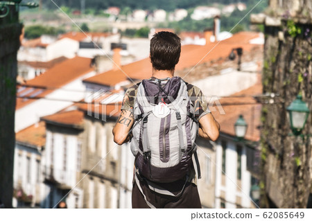 Male Pilgrim Walking Around Santiago De Compostela In Spain 62085649