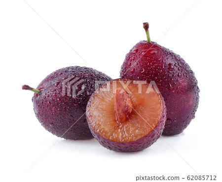 prune or plum with drop of water isolated on white 62085712
