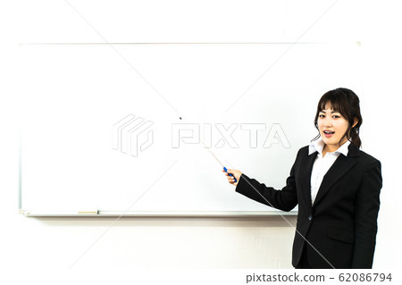 A woman giving a presentation A woman giving a presentation 62086794