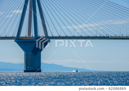 Pylon of the Cable-Stayed Bridge and Motor Boat Pylon of the Cable-Stayed Bridge and Motor Boat 62086869