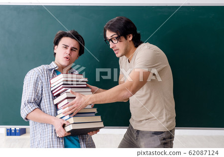 Two male students in the classroom 62087124