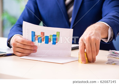 Young male sales analyst in growth concept 62087145