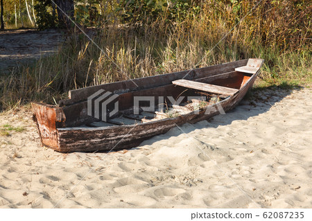 Old broken boat Old broken boat 62087235