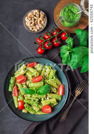 Homemade tortiglioni pasta with vegan pesto sauce 62088748