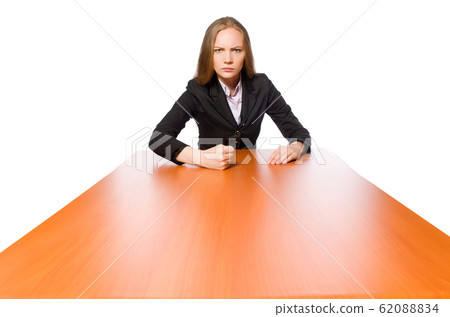 Female employee sitting at long table isolated on white 62088834