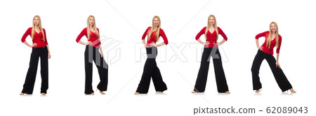 Young woman in flared pants isolated on white 62089043