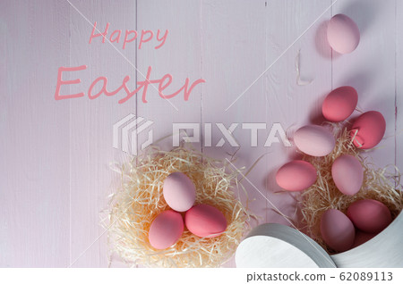 Easter colorful eggs on wooden backdrop Easter colorful eggs on wooden backdrop 62089113