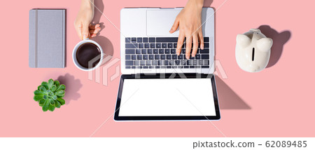 Person using a laptop computer Person using a laptop computer 62089485
