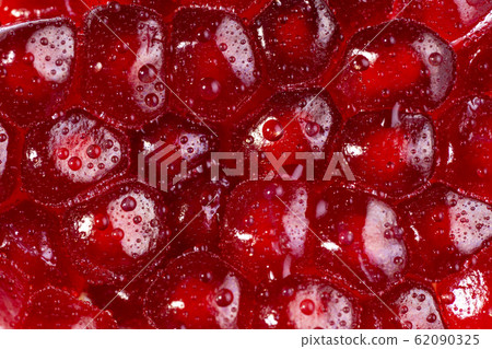 Pomegranate seeds close up background. Texture Pomegranate seeds close up background. Texture 62090325