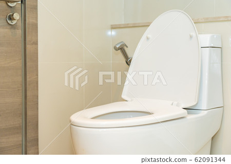 Toilet seat bowl in bathroom interior Toilet seat bowl in bathroom interior 62091344