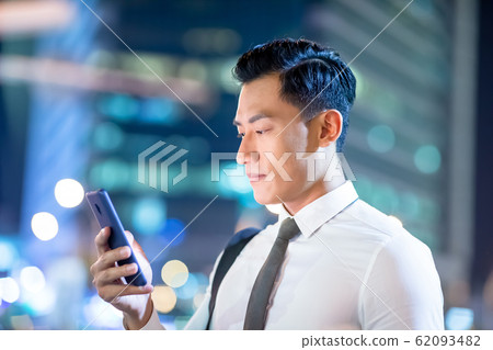 businessman use phone outdoor 62093482