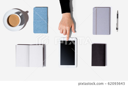 Person using a tablet computer Person using a tablet computer 62093643