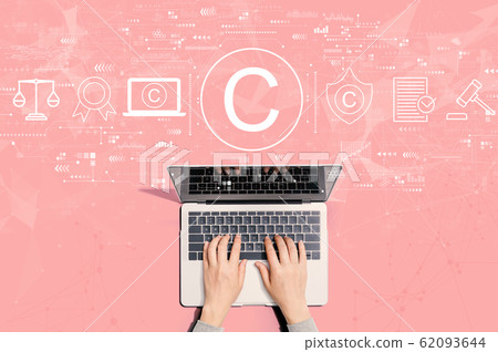 Copyright concept with person using laptop 62093644