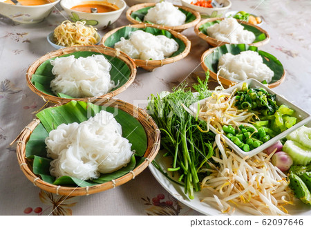 Set of thai rice noodles fish curry  sauce with 62097646