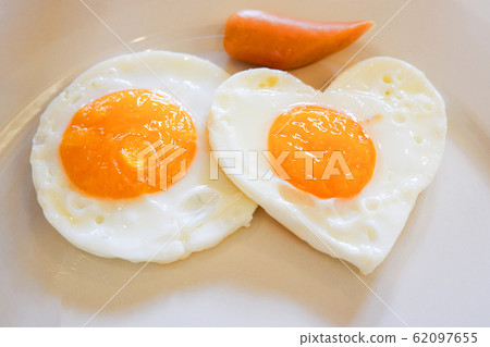 breakfast egg heart shaped on plate romantic love breakfast egg heart shaped on plate romantic love 62097655