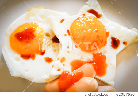 breakfast egg star shaped on plate and hot dog breakfast egg star shaped on plate and hot dog 62097656