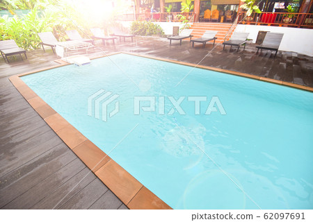 Swimming pool backyard in the park garden with 62097691