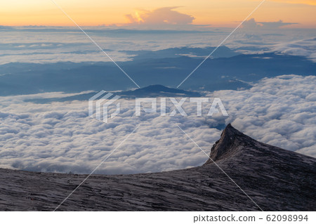 Sunrise landscape over horizon and clouds at Kota Kinabalu's summit in Malaysia	 62098994