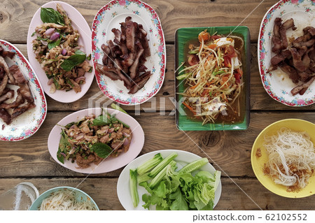 Traditional Thai spicy papaya salad, Grilled pork 62102552
