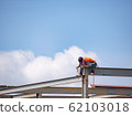 Builder welding on high-rise steel frame 62103018