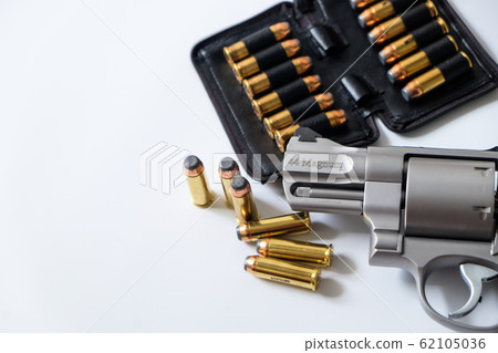.44 magnum revolver gun with bullet on white .44 magnum revolver gun with bullet on white 62105036