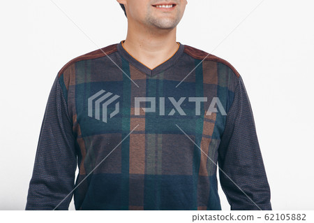 the concept of advertising clothes, fashion show-men's hoodies, shirts on a white background. Ornament and colors, decorative elements: stripes, locks, patches. Copy space the concept of advertising clothes, fashion show-men's hoodies, shirts on a white background. Ornament and colors, decorative elements: stripes, locks, patches. Copy space 62105882