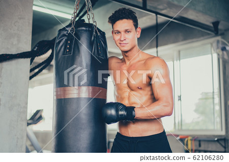 Sport man boxing at fitness gym. Mental health Sport man boxing at fitness gym. Mental health 62106280