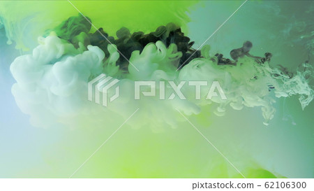 Multicolored composition from ink streams. Black and white streams of ink float and mix in the center of the composition. Colorful abstract combination of acrylic rainbow ink on a light green Multicolored composition from ink streams. Black and white streams of ink float and mix in the center of the composition. Colorful abstract combination of acrylic rainbow ink on a light green 62106300