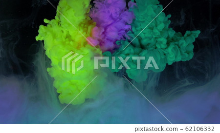 Multicolored composition from ink streams. ink streams from the rainbow spectrum float and mix in the center of the composition. Colorful abstract combination of acrylic rainbow colored black 62106332