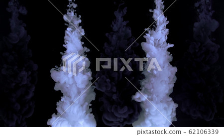 Monochrome composition of ink jets. trickles of black and white ink mixed in the center of the composition. Colorful abstract combination of acrylic rainbow painted black background. Ink in water 62106339