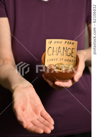 Bowl With Coins With Sign 62106832