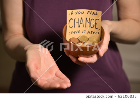 Bowl With Coins With Sign Bowl With Coins With Sign 62106833