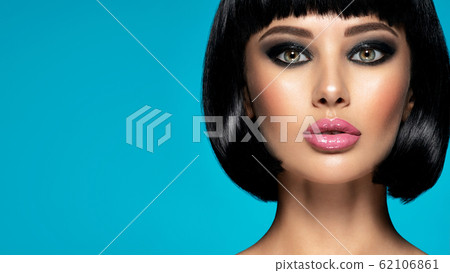 Glamour fashion model with black gloss make-up. Glamour fashion model with black gloss make-up. 62106861