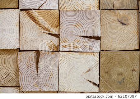 Texture of a cut square wood block. Texture of a cut square wood block. 62107397