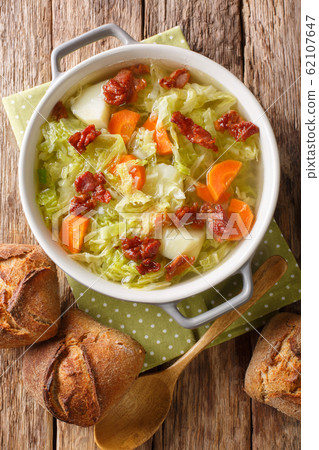 Tasty savoy cabbage soup with potatoes and fried Tasty savoy cabbage soup with potatoes and fried 62107647