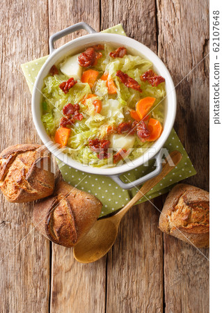 Fresh hot savoy cabbage soup with vegetables and Fresh hot savoy cabbage soup with vegetables and 62107648